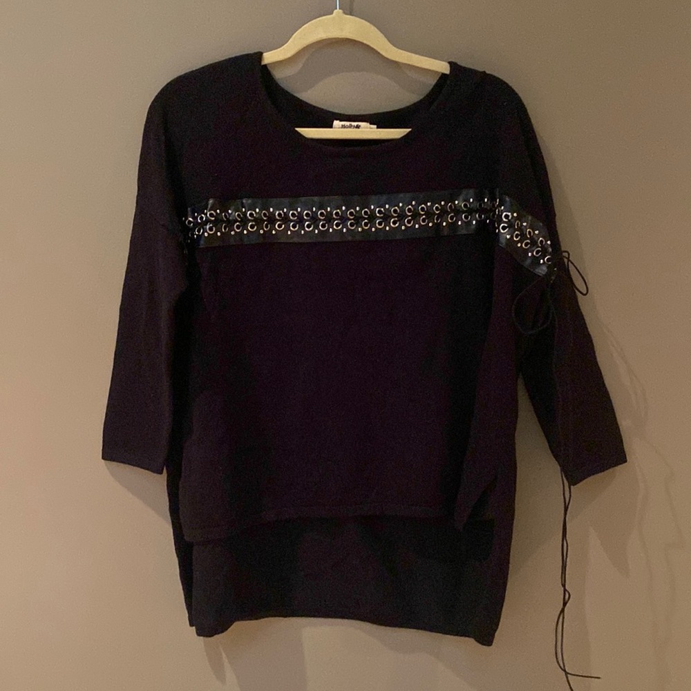 Molly Bracken, black viscose sweater, cute black leather w silver eyelet